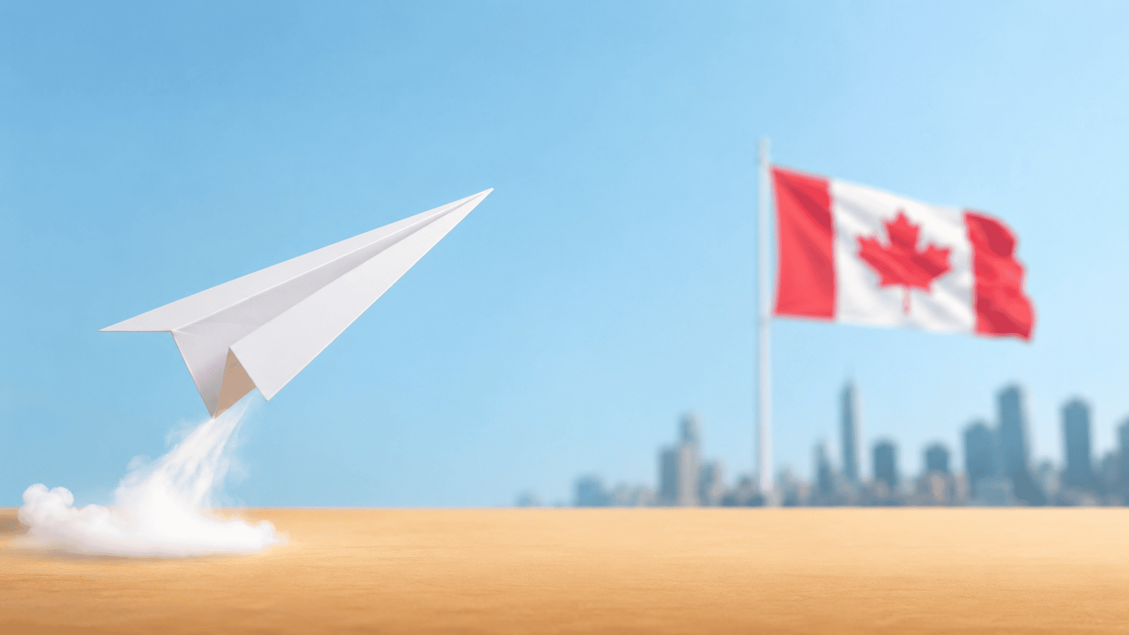 Paper airplane launching upward from a wooden surface with a blurred Canadian flag and city skyline in the background, representing the early momentum and startup phase of building a business in Canada