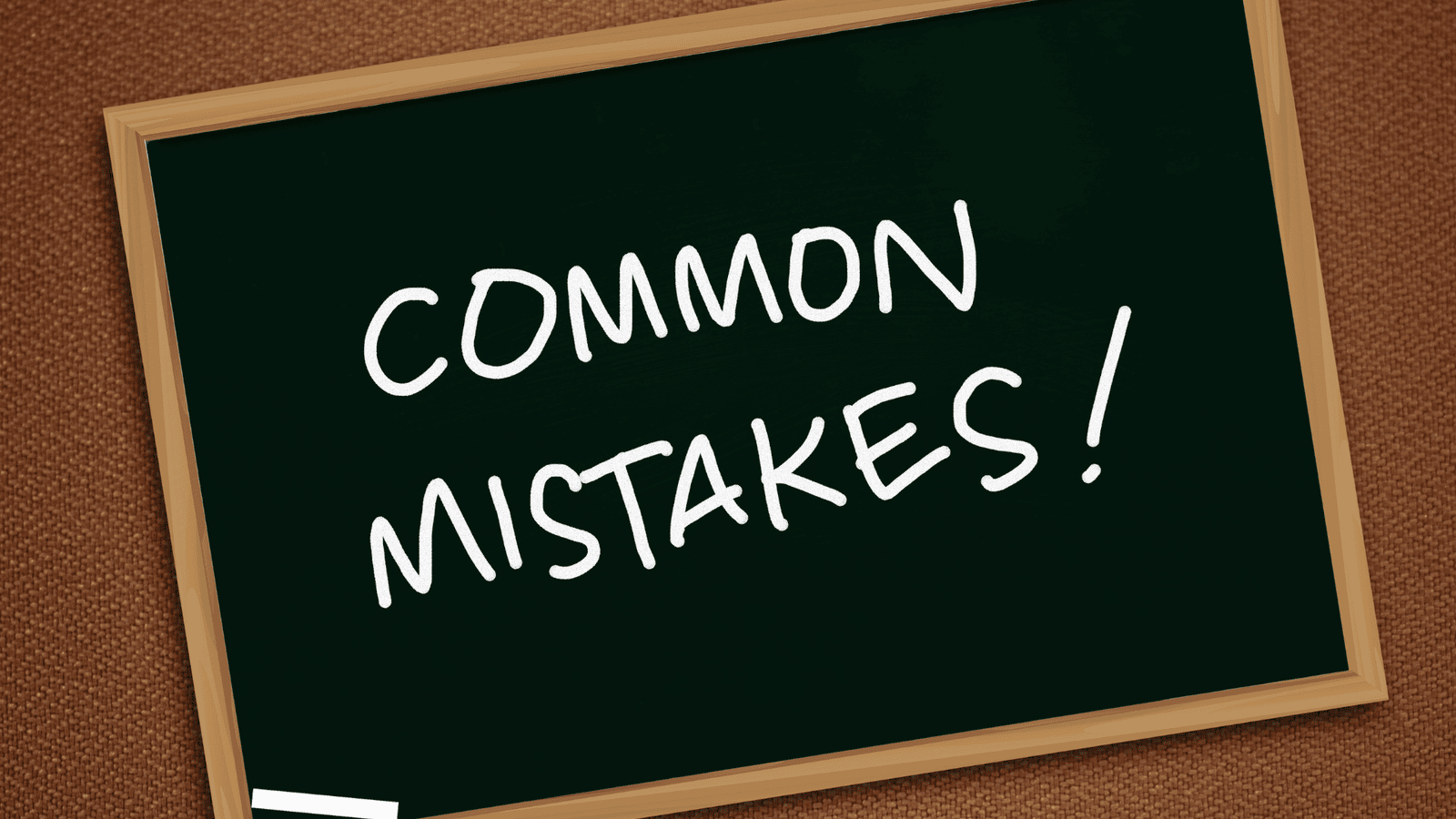 Chalkboard displaying ‘Common Mistakes’ representing errors to avoid during a CRA audit, such as missing records, late responses, incomplete documentation, and poor communication for Canadian small businesses.