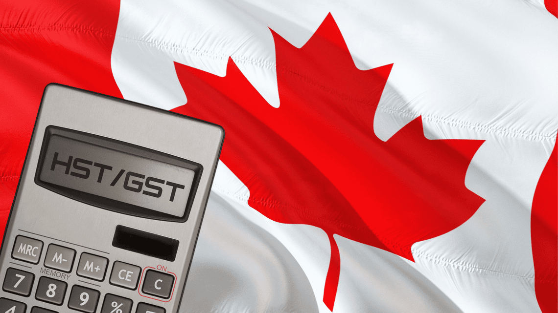Calculator displaying HST/GST in front of the Canadian flag representing sales tax calculation and collection for service businesses operating across Canada.