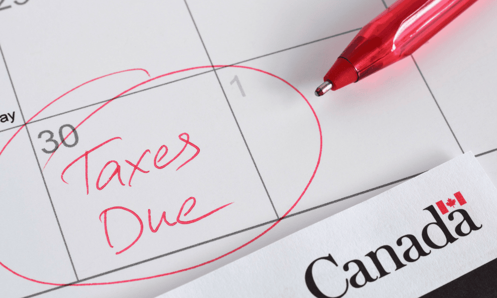 Calendar page marked with April 30 and the words ‘Taxes Due’ circled in red beside a pen and Canada label, representing the CRA tax filing deadline for entrepreneurs and small businesses in London, Ontario.